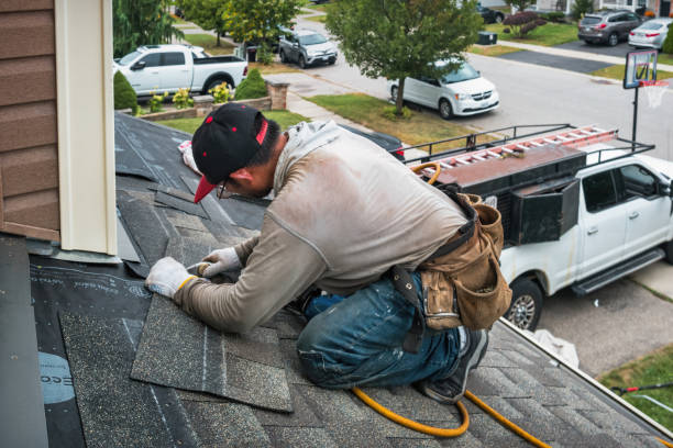 Professional Emergency Roof Repair technician working in Russell, PA